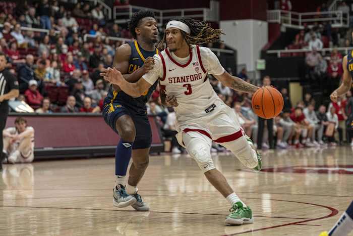 Stanford Cardinal guard Kanaan Carlyle (3) drives the lane against California Golden Bears guard Jalen Cone (15) during the second half at Maples Pavillion.